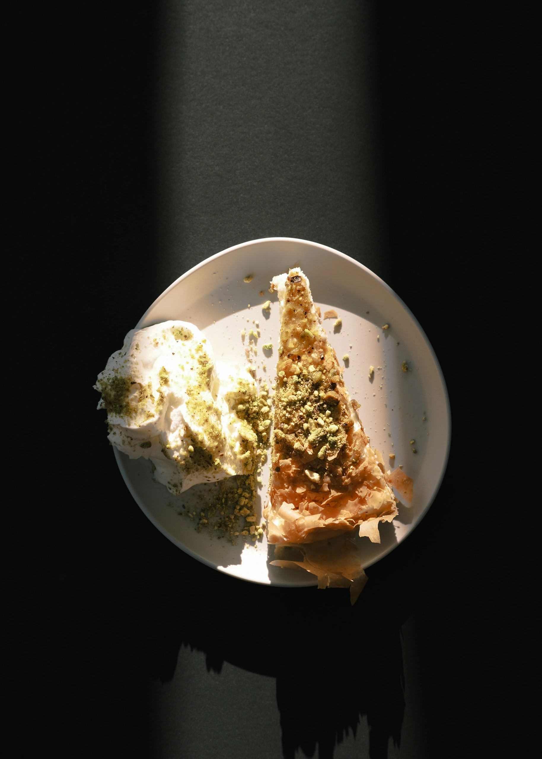 Fine dining dish presented by catering staff